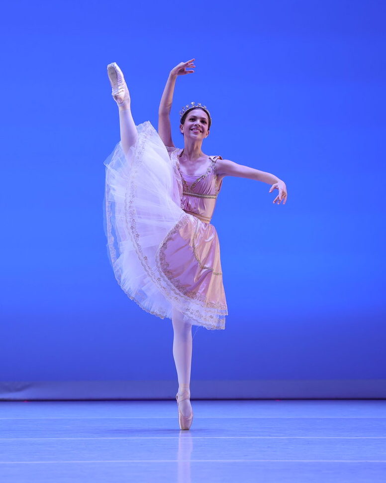 Brevard Ballet Academy competition dancer performing on stage in a pink tutu