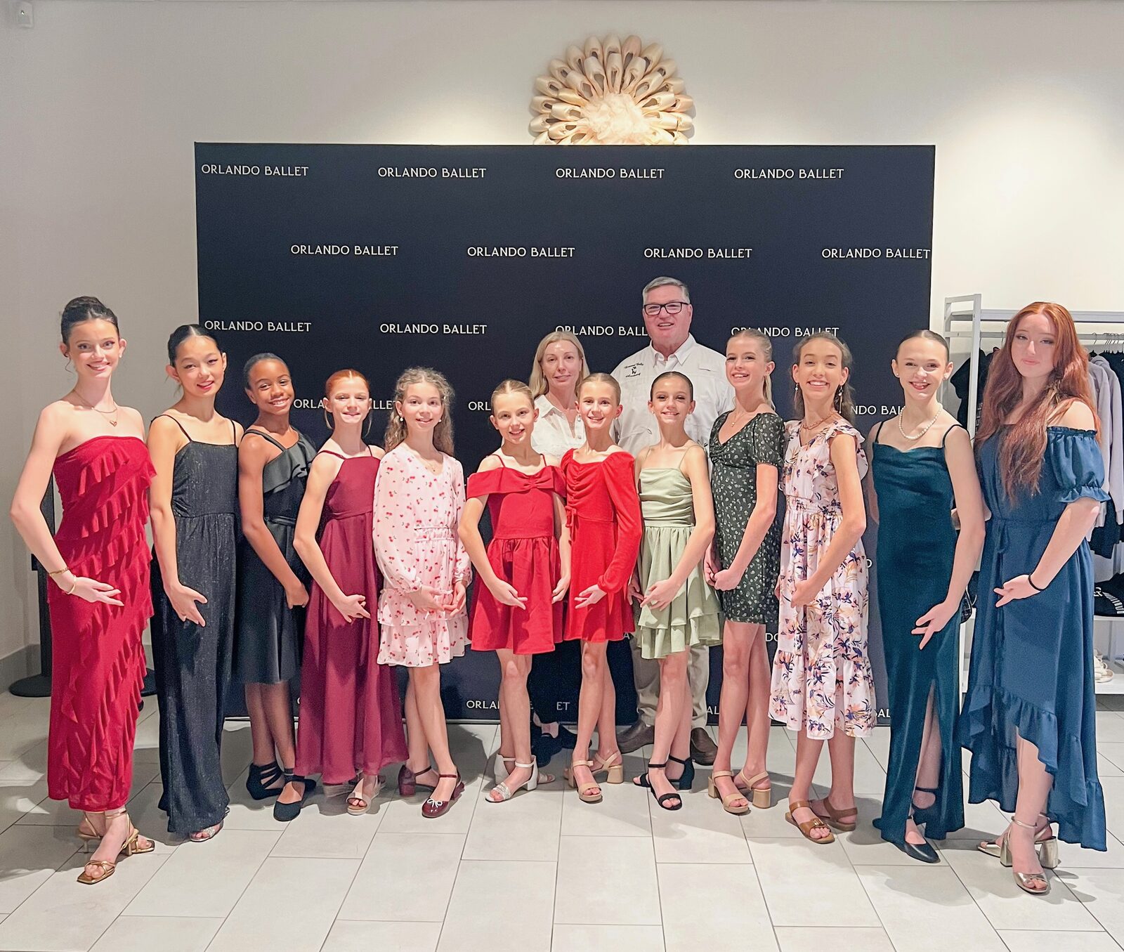 Brevard Ballet Academy dancers and directors at the Orlando Ballet backdrop