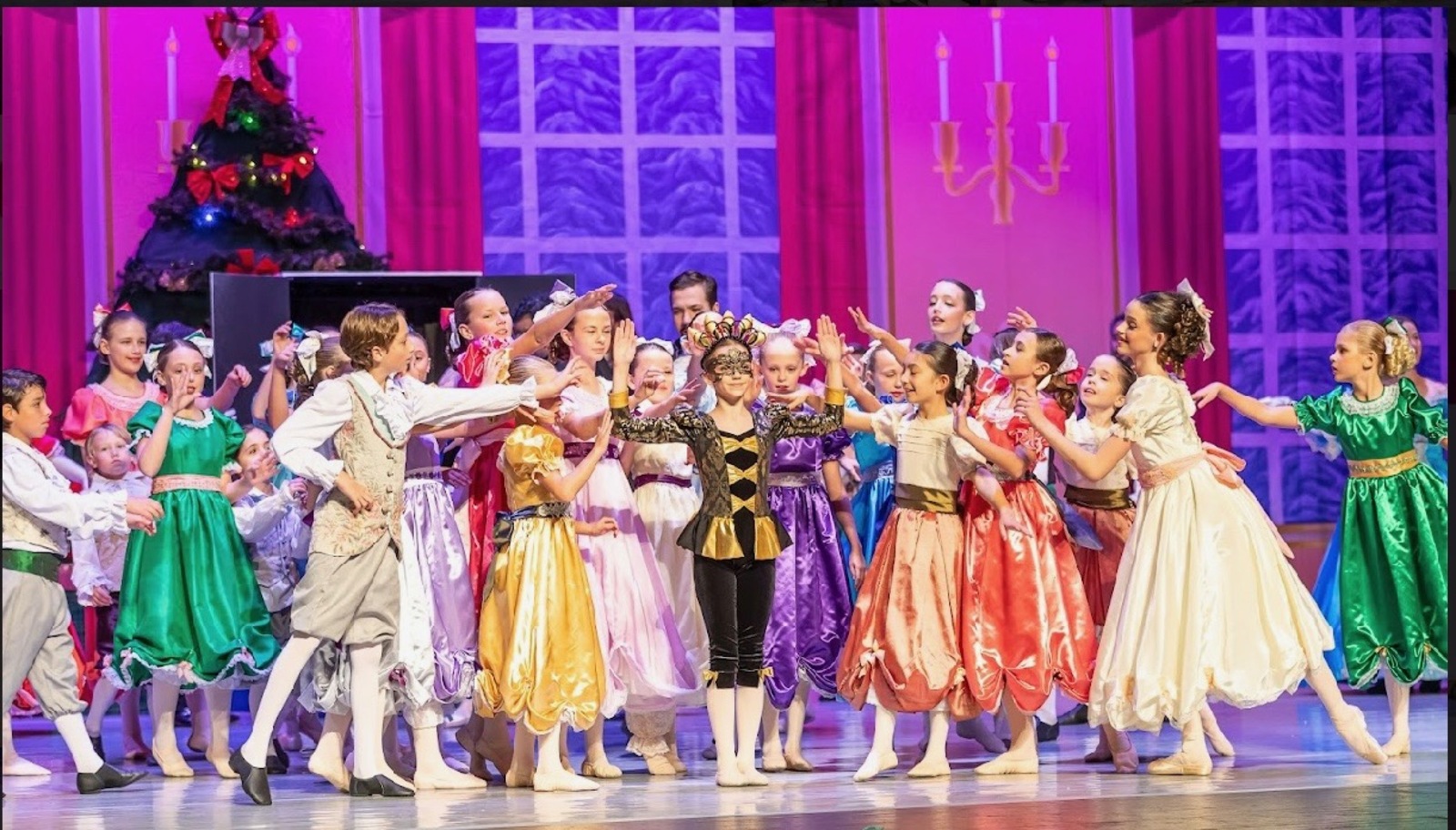 The Nutcracker party scene with young dancers and the Mouse King performed by the Brevard Ballet Youth Company in Melbourne FL